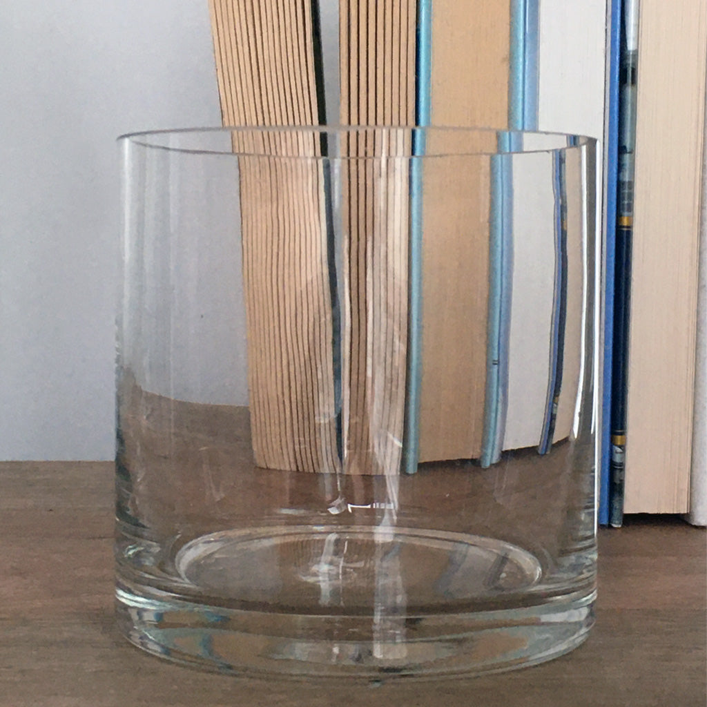 Cylinder Glass Bud Vase, clear. A versatile clear vase that will blend into any home decor. Makes a wonderful gift.