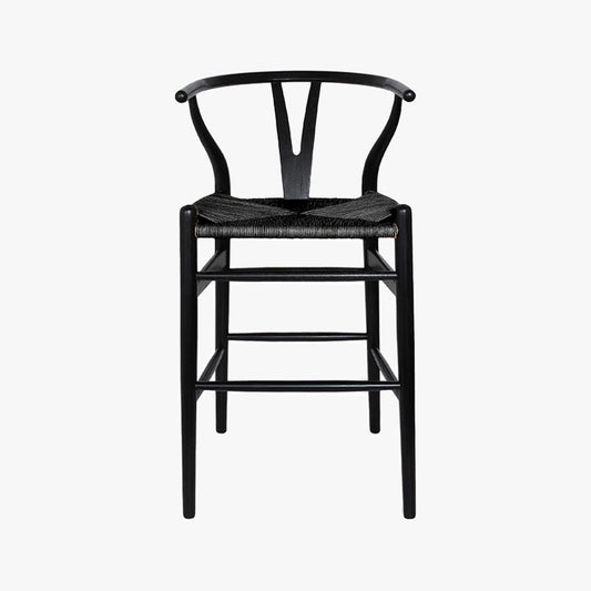 Frida Counter Stool, Black is a minimalist counter stool inspired by the mid-mod 1950s Hans J Wegner wishbone chairs with a Y-back design, curving top rail, and tapered legs details.