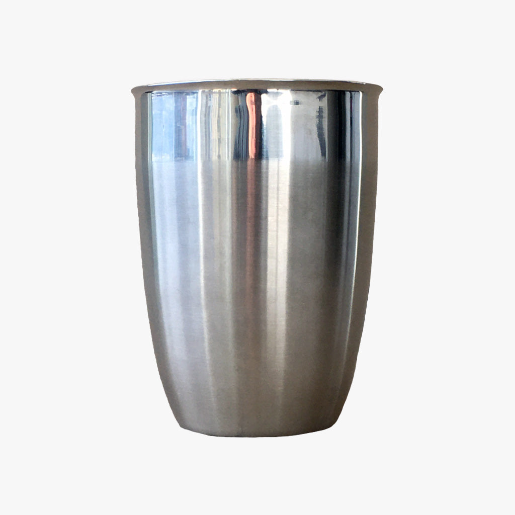 Pic. 1 Paris Bathroom Tumbler, stainless steel  has clean lines and a polished rim detail. Makes a great housewarming gift for anyone looking to add a touch of refined elegance to their home decor.